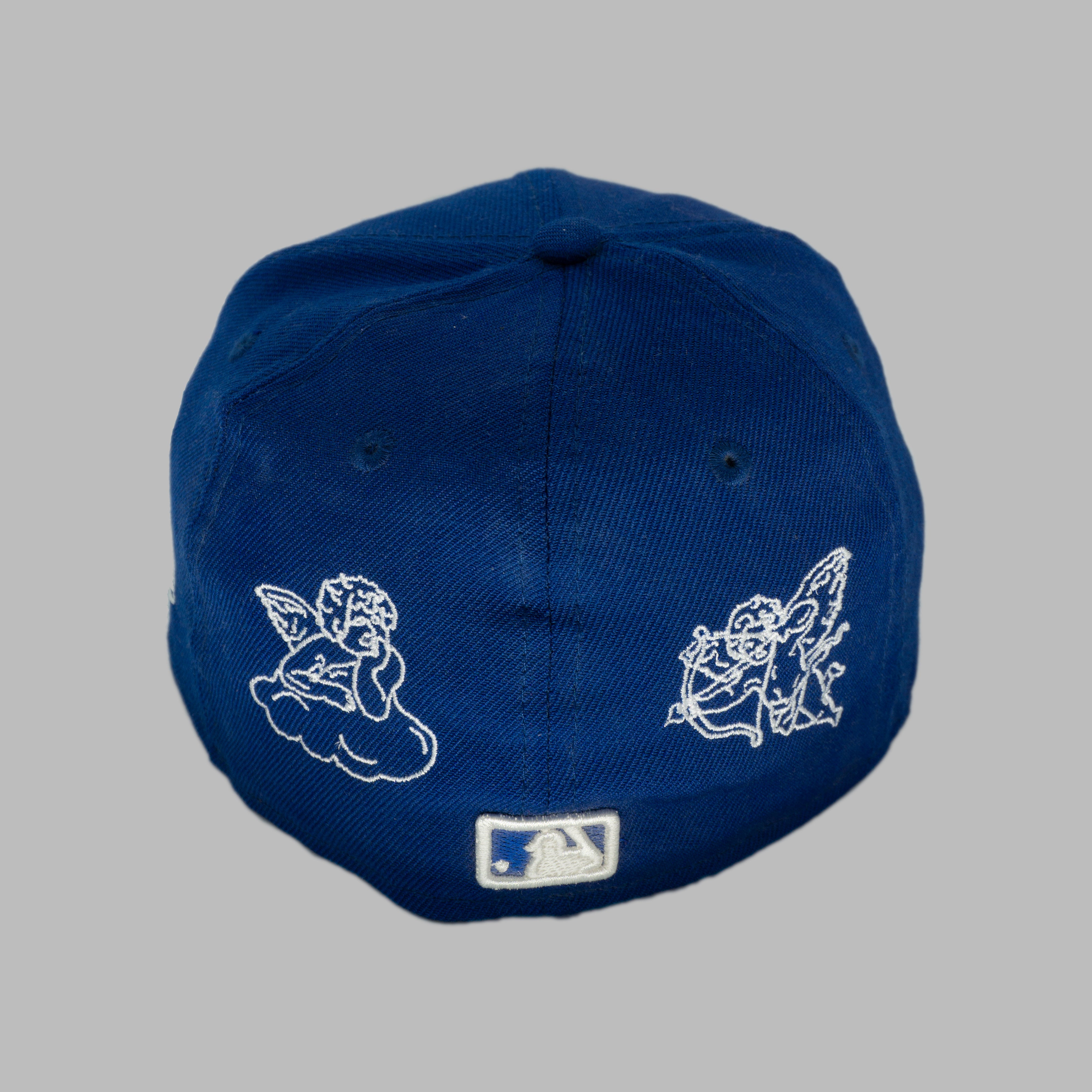 BLUE HOLY FITTED (size 7)